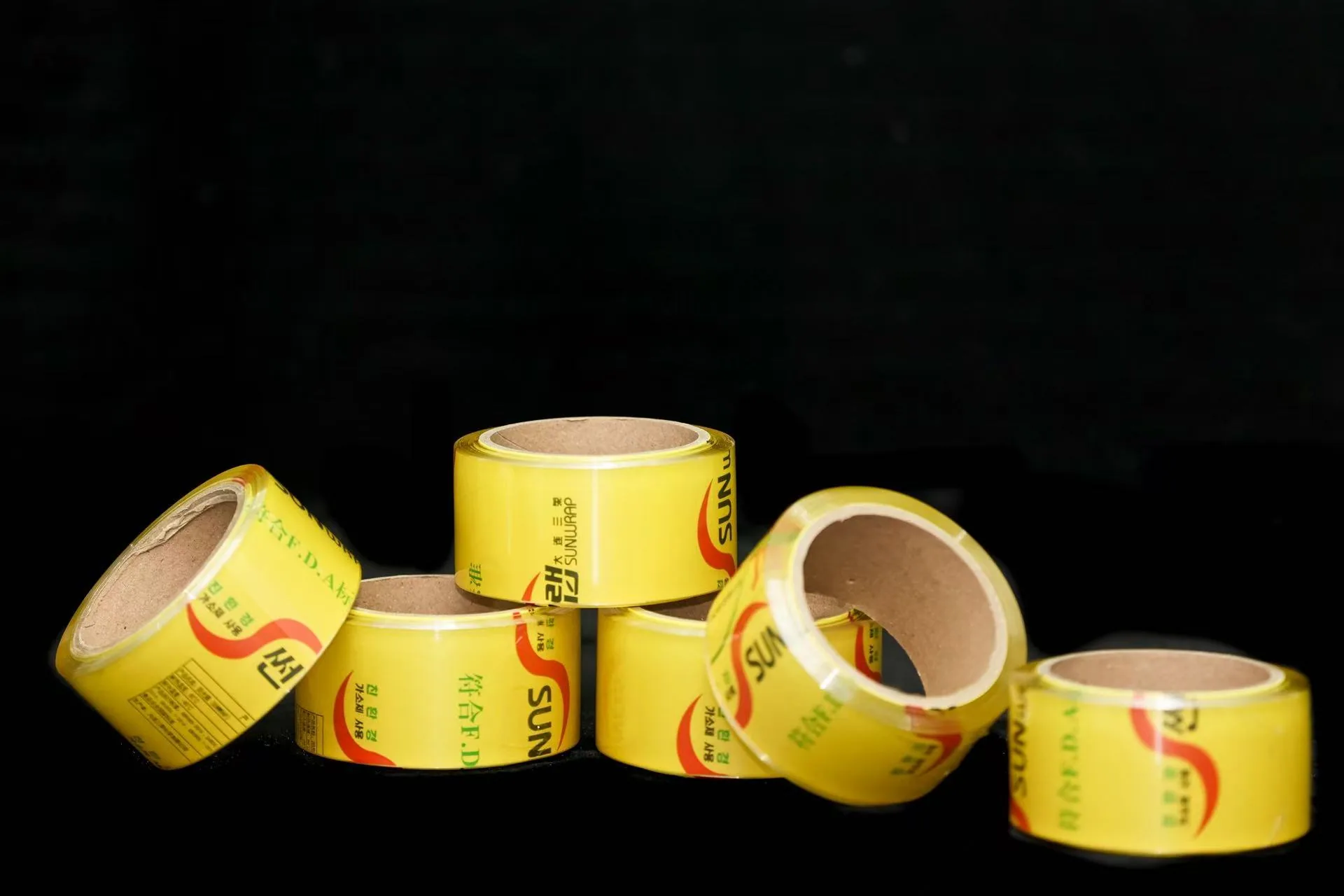 Rollos de film alimentario PVC SUNWRAP con empaque amarillo certificado FDA